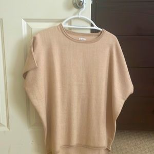 Sleeveless,loose sweater-worn over shirt or sweater. $495 bought never worn